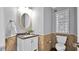 Unique bathroom with stone-like walls and countertop, offering a spa-like retreat at 28021 N 23Rd Dr, Phoenix, AZ 85085