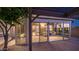 Cozy covered patio area with comfortable seating, perfect for relaxing and entertaining outdoors at 28021 N 23Rd Dr, Phoenix, AZ 85085