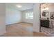 Spacious bedroom featuring light wood floors and an attached bathroom with a modern vanity at 3651 N 49Th Pl, Phoenix, AZ 85018