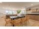 Dining area with a view of the kitchen and lots of natural light at 3651 N 49Th Pl, Phoenix, AZ 85018