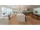 Bright kitchen featuring an oversized island with a stone countertop and stainless appliances at 3651 N 49Th Pl, Phoenix, AZ 85018