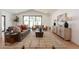 Spacious living room showcasing stylish decor, large windows, and an inviting layout at 3651 N 49Th Pl, Phoenix, AZ 85018