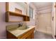 Full bathroom featuring a shower, single sink and tile flooring at 4140 E Glenrosa Ave, Phoenix, AZ 85018