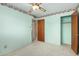 Light-filled bedroom featuring carpet flooring and a spacious layout at 4140 E Glenrosa Ave, Phoenix, AZ 85018