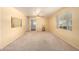 Cozy living room featuring a large window and soft carpet, with ample space for furnishings at 4140 E Glenrosa Ave, Phoenix, AZ 85018
