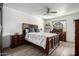 Spacious bedroom with a large window, ceiling fan, and neutral wall color at 4150 E Cactus Rd # 205, Phoenix, AZ 85032