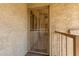 A secure screen door entrance with a unit number offers a glimpse inside at 4150 E Cactus Rd # 205, Phoenix, AZ 85032