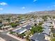 Elevated view of residential neighborhood with well-manicured yards against the backdrop of distant mountains at 4252 E Zia St, Phoenix, AZ 85044