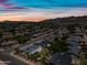 Scenic aerial view of residential neighborhood and desert landscaping with mountain views at 4252 E Zia St, Phoenix, AZ 85044