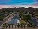 Wide aerial shot showcasing a well-maintained neighborhood and desert landscaping at 4252 E Zia St, Phoenix, AZ 85044