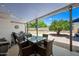 Covered outdoor dining area in a serene backyard setting, ideal for entertaining guests at 4252 E Zia St, Phoenix, AZ 85044