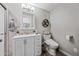 Modern bathroom with updated vanity, toilet, and fixtures for comfort and style at 4252 E Zia St, Phoenix, AZ 85044