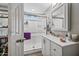 Bright bathroom featuring a glass-enclosed shower, updated vanity, and stylish fixtures at 4252 E Zia St, Phoenix, AZ 85044