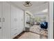 Well-lit bedroom featuring ample closet space, a cozy sitting area, and a serene view, creating a tranquil retreat at 4252 E Zia St, Phoenix, AZ 85044