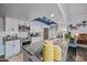 Bright kitchen features white cabinets, stainless steel appliances, granite countertops, and decor at 4252 E Zia St, Phoenix, AZ 85044