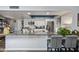 Bright, open kitchen featuring granite countertops and a breakfast bar with seating at 4252 E Zia St, Phoenix, AZ 85044