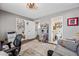 Comfortable home office setup with closet storage and view of the ensuite bathroom at 4252 E Zia St, Phoenix, AZ 85044