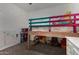Whimsical bedroom with loft bed, colorful accents, and playful decorations at 465 E Frances Ln, Gilbert, AZ 85295