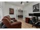 Bright office space with two work areas and a comfortable recliner at 465 E Frances Ln, Gilbert, AZ 85295
