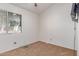 Vacant bedroom with carpet, window and electric outlets at 4814 W Rose Ln, Glendale, AZ 85301