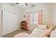 Bright bedroom featuring a large closet and natural light at 4918 W Wahalla Ln, Glendale, AZ 85308