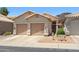Charming single-story home with a two-car garage and desert landscaping for low-maintenance living at 4918 W Wahalla Ln, Glendale, AZ 85308