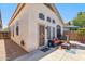 Rear exterior featuring outdoor seating and a grill at 4918 W Wahalla Ln, Glendale, AZ 85308