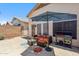 Back patio featuring outdoor seating and a grill at 4918 W Wahalla Ln, Glendale, AZ 85308