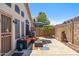 Patio featuring outdoor seating, a grill, and a privacy wall at 4918 W Wahalla Ln, Glendale, AZ 85308