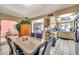 Dining room with seating for six, with views through to the living room and access to the kitchen at 5140 N 69Th Ave, Glendale, AZ 85303