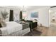 An expansive main bedroom featuring a king bed, sitting area and a walk out patio at 6043 E Hearn Rd, Scottsdale, AZ 85254