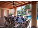 Covered patio with a large dining table and chairs, perfect for outdoor entertaining at 6043 E Hearn Rd, Scottsdale, AZ 85254