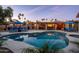 Tranquil backyard pool with ample seating, a nearby gazebo, and lovely sunset views at 6043 E Hearn Rd, Scottsdale, AZ 85254