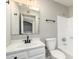 Bright bathroom features a modern vanity and shower/tub combination with neutral color palette at 619 E Jensen St # 14, Mesa, AZ 85203