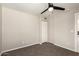 Carpeted bedroom with neutral paint and a ceiling fan at 619 E Jensen St # 14, Mesa, AZ 85203
