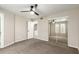 Bedroom features carpet flooring, neutral paint, and a ceiling fan at 619 E Jensen St # 14, Mesa, AZ 85203