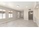Bright and airy living room with neutral paint, tile flooring, and recessed lighting at 619 E Jensen St # 14, Mesa, AZ 85203