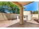 This outdoor patio features a built in grill with access to trees and a blue sky at 619 E Jensen St # 14, Mesa, AZ 85203