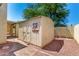 Well maintained shed with window and double doors on a home property at 619 E Jensen St # 14, Mesa, AZ 85203