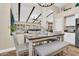 Comfortable dining area offers a view of the living room with beamed ceilings, and natural light at 6352 W Hackamore Dr, Phoenix, AZ 85083