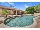 Backyard swimming pool with covered patio, barbecue and outdoor seating at 6352 W Hackamore Dr, Phoenix, AZ 85083
