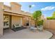 Charming backyard with shaded seating area and grill for outdoor cooking and dining at 6611 N 79Th Pl, Scottsdale, AZ 85250