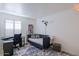 This bedroom has stylish furniture, a large window, and a desk for maximum comfort at 6611 N 79Th Pl, Scottsdale, AZ 85250