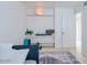 Versatile bonus room with shelving, light-colored floors, natural light, and potential for multiple uses at 6611 N 79Th Pl, Scottsdale, AZ 85250