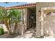 Close up of the front entrance featuring gated access and a well-maintained yard at 6611 N 79Th Pl, Scottsdale, AZ 85250