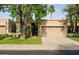 Inviting single-story home with a lush front lawn and convenient two-car garage at 6611 N 79Th Pl, Scottsdale, AZ 85250