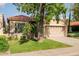 Charming single-story home featuring a well-maintained lawn and a two-car garage at 6611 N 79Th Pl, Scottsdale, AZ 85250