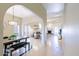 Bright and airy living space featuring tile floors and a fireplace with an open-concept layout at 6611 N 79Th Pl, Scottsdale, AZ 85250