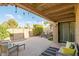 Inviting covered patio with comfortable seating, perfect for outdoor relaxation and entertaining at 6611 N 79Th Pl, Scottsdale, AZ 85250