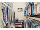 Walk-in closet with shelving and hanging storage for optimal organization at 6717 E Aire Libre Ln, Scottsdale, AZ 85254